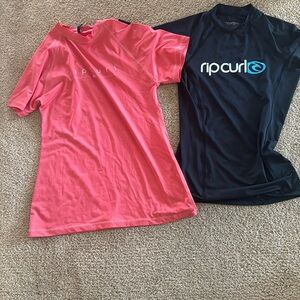 2 medium rash guards